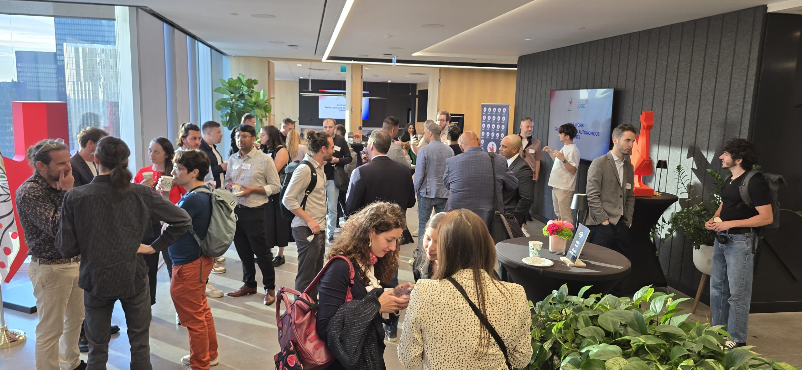 Attendees networking at the La French Tech Toronto and BDC June meetup on AI agents, BDC Square Toronto